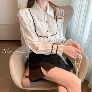 Áo sơ mi viền đen