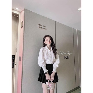 Áo sơ mi trắng tay bo chun