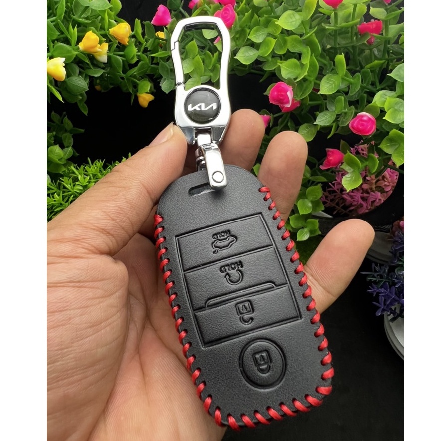 Bao Da chì khóa 4 nút Smartkey Xe ô tô Kia Seltos, Kia Sonet đời mới nhất.