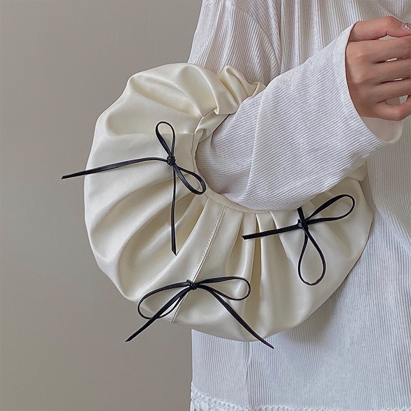 Túi xách tròn nhỏ đính nơ thời trang cho nữ