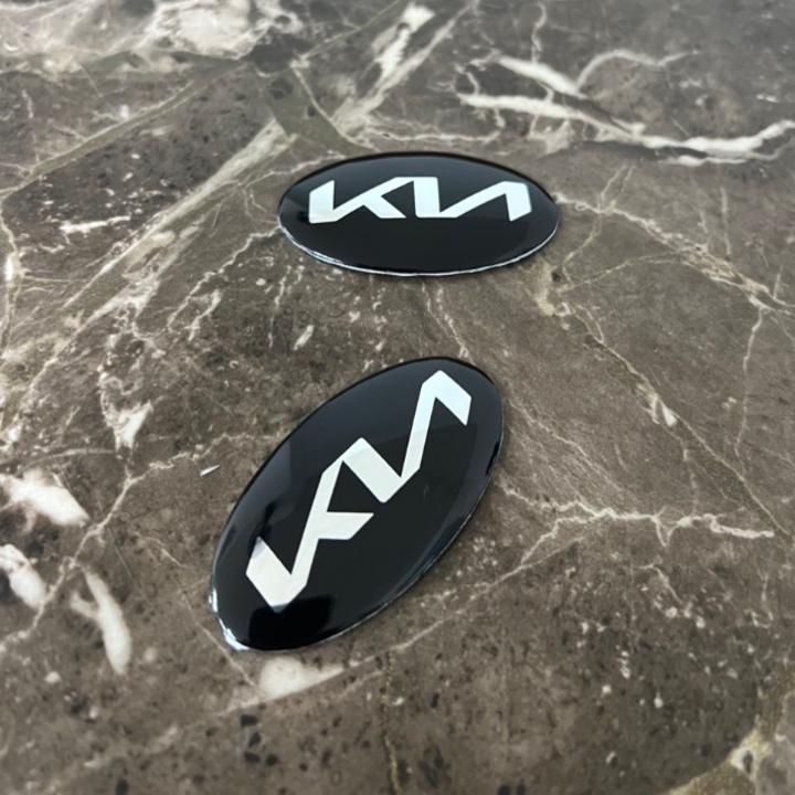 01 CHIẾC Logo biểu tượng vô lăng xe ô tô Kia ( KIỂU DÁNG MỚI )