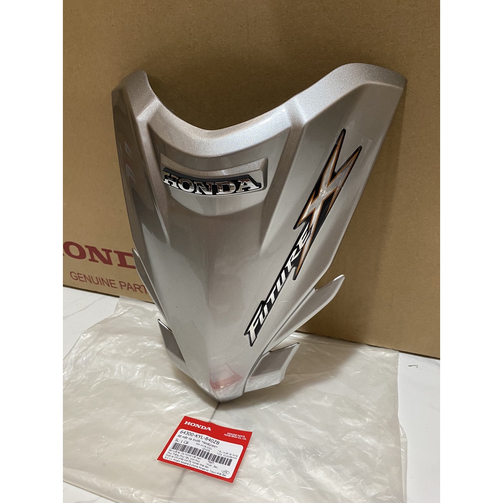 Bộ mặt nạ trước HONDA FUTURE X năm 2010 màu Xám bạc.