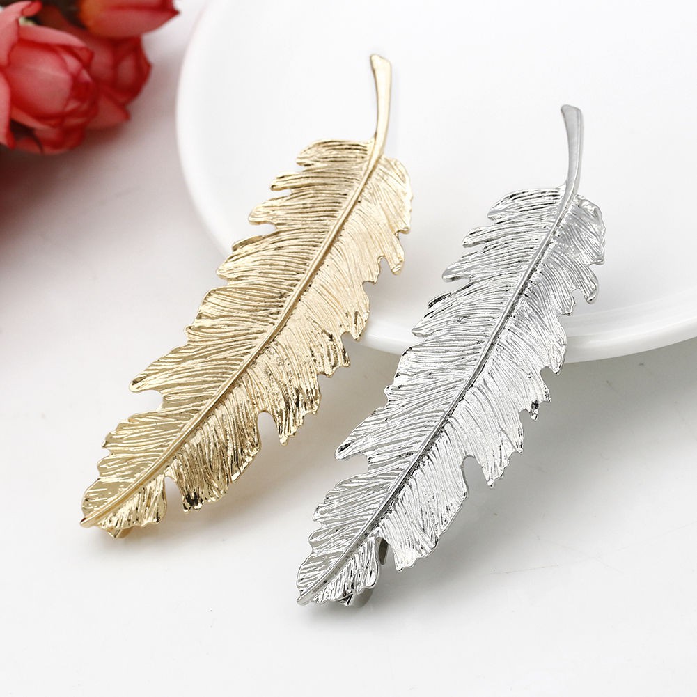 Kẹp tóc hình lông vũ màu vàng / bạc