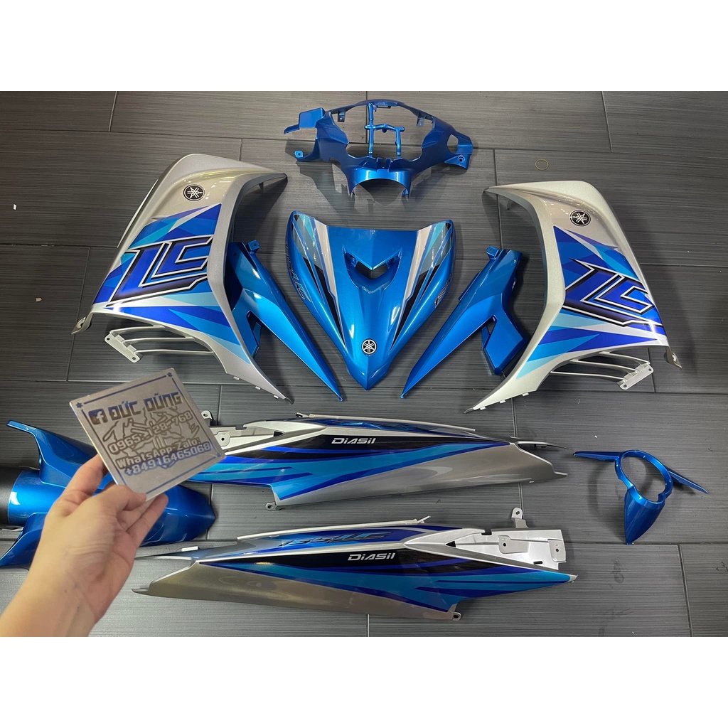 Dàn áo Ex 135 bạc xanh luôn tem