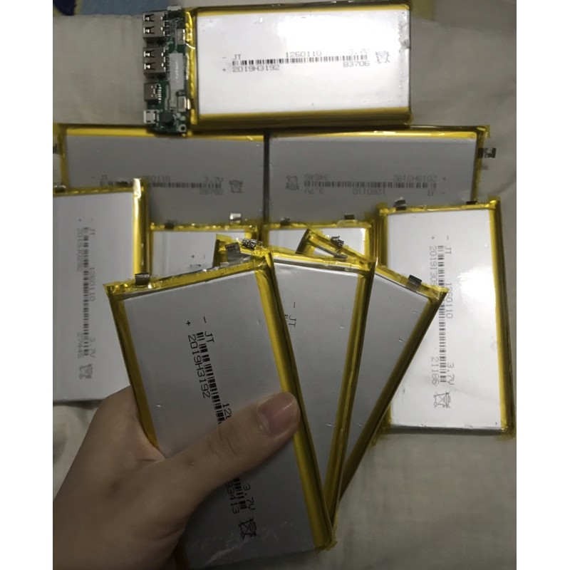 combo pin poly 10000mah + mạch sạc dư phòng out 2a NEW