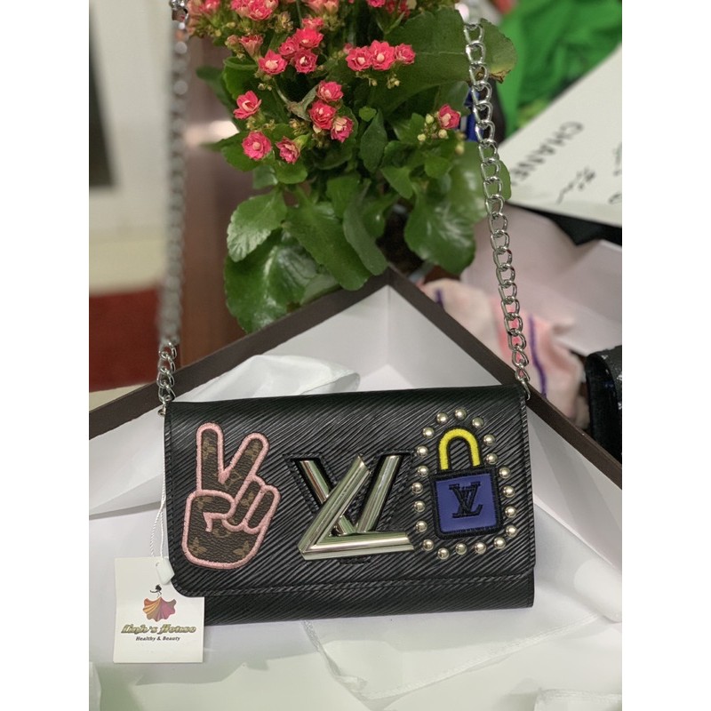 Túi lv khoá xoay