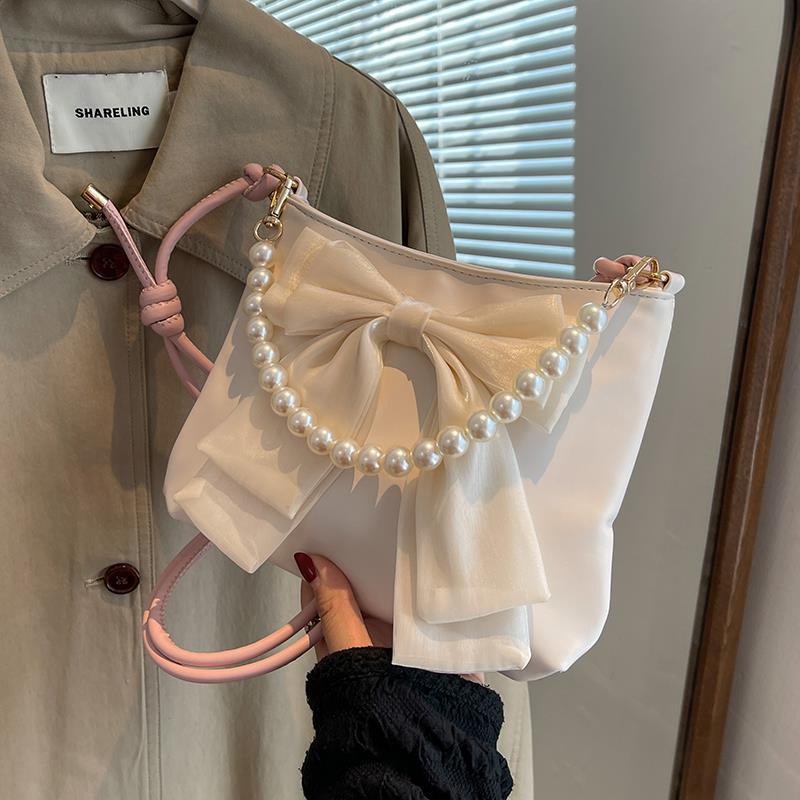 Túi đeo chéo Ielgy dạng xô thắt nơ thích hợp cho tất cả các phong cách dành cho bạn nữ