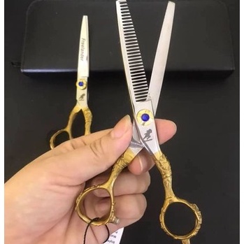 Bộ kéo cắt tóc Nhật bản Freelander FR05 ( Mua một bộ kéo được tặng bao da+lọ dầu+khóa kéo+2lược)