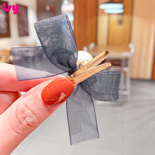 Kẹp tóc nơ ngọc trai lưới