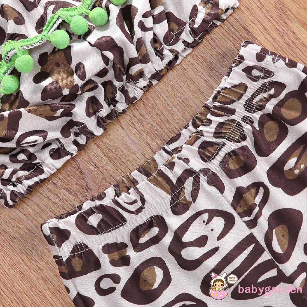 Áo sát nách phối tua rua và quần ống loe cho bé gái