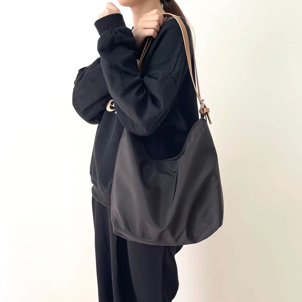 Túi đeo chéo một bên vai làm từ vải oxford thời trang cho nữ