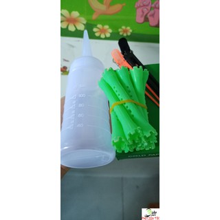 Bộ dụng cụ nhuộm tóc gồm có 10 trục uốn tóc, 2 kẹp vịt, bình tra dung dịch uốn và giấy uốn lạnh