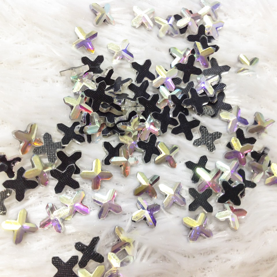 Đá ủi nhiệt hình ngôi sao 4 cánh, hạt đá ủi áo đầm ngôi sao ánh 7 màu hat hong kong siêu đẹp