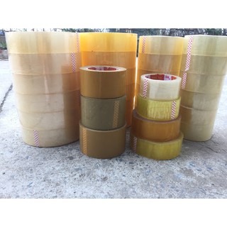 Combo Băng dính 24c Vàng đục lõi giấy và 6c trắng trong lõi nhựa 3mm .