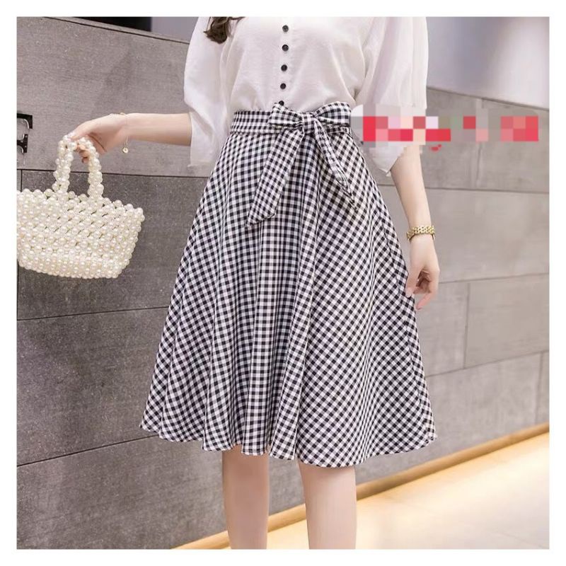 chân váy xòe kẻ phối nơ dài 60cm