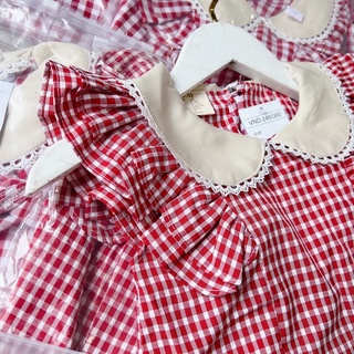 Váy kẻ caro đỏ bé gái