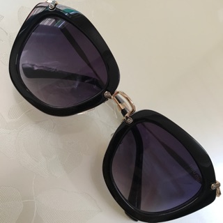 Mắt kính Miumiu