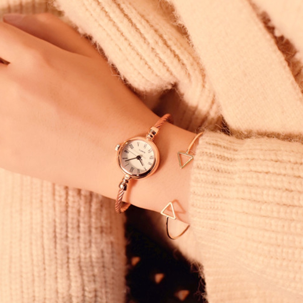 Đồng Hồ Quartz Mặt Tròn Chất Liệu Thép Không Gỉ