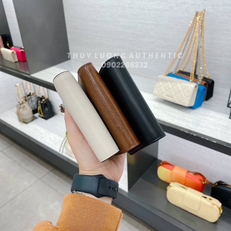 Ví nữ Charles and Keith màu cam, nâu, kem