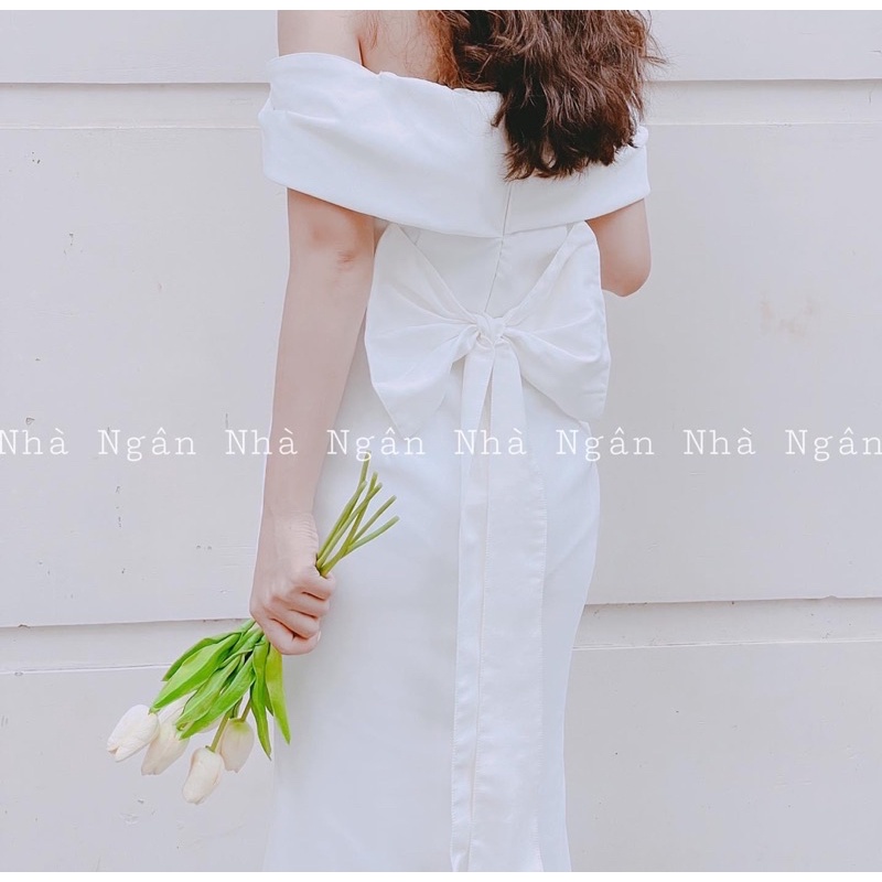 Đầm trắng body đuôi cá trễ vai nơ sau lưng