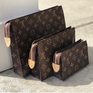 Cluth cầm tay lv 2 size 20/26 - by anh dinh phuong