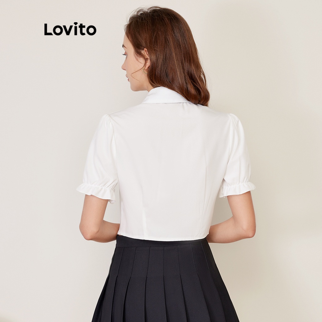 Áo Lovito có huy hiệu cổ thắt dây màu trơn phong cách thường ngày L27AD028 (màu trắng)
