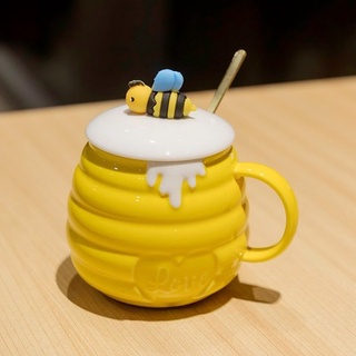 Ly sứ honey có nắp đậy + tặng kèm thìa ngộ nghĩnh .