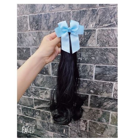 Kẹp tóc nơ xoăn dài cho bé