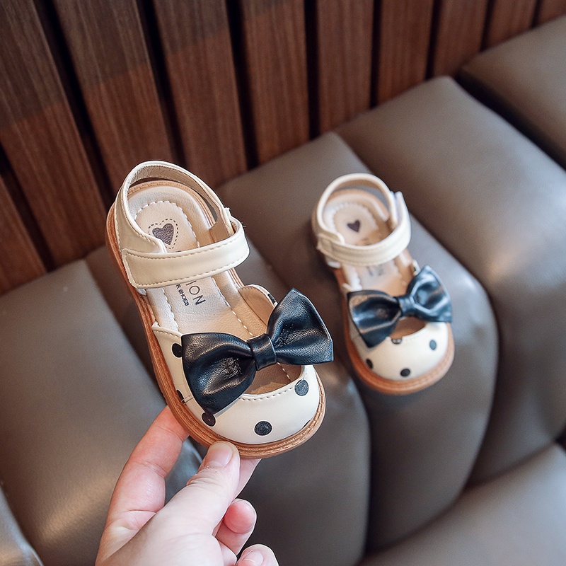 Giày búp bê bé gái, Giày sandal bé gái chấm bi quai dán phối nơ chất da PU mềm chống trơn trượt tốt  M13