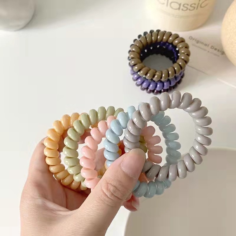 Dây buộc tóc thiết kế lò xo đơn giản thời trang phong cách Hàn Quốc