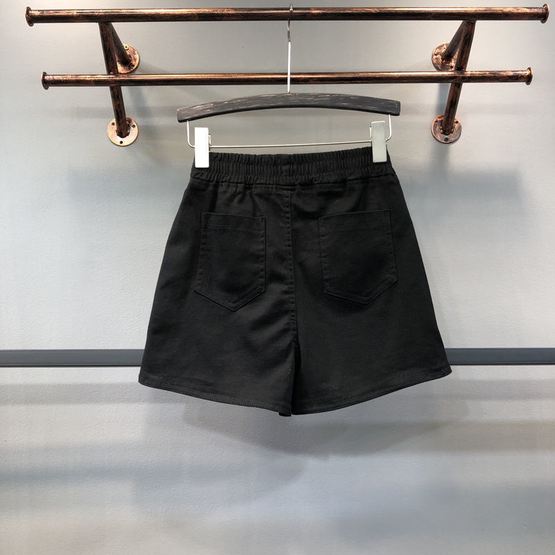 Quần short denim trắng chữ A lưng thun thể thao nóng bỏng Châu Âu