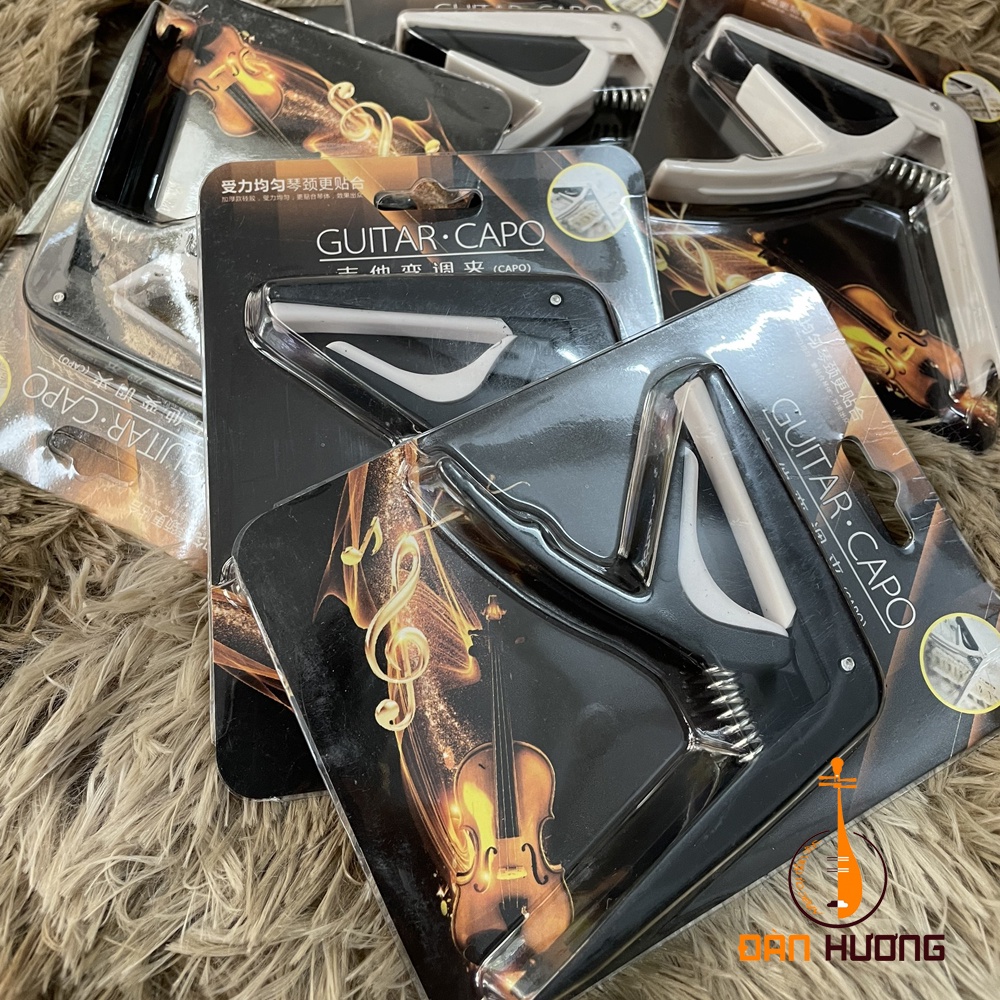 Capo classic ngắn  kiêm tháo chốt dây đàn