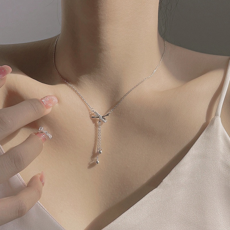 Dây chuyền mặt hình nơ đính đá pha lê nhân tạo phối tua rua xinh đẹp thời trang làm quà tặng dành cho nữ