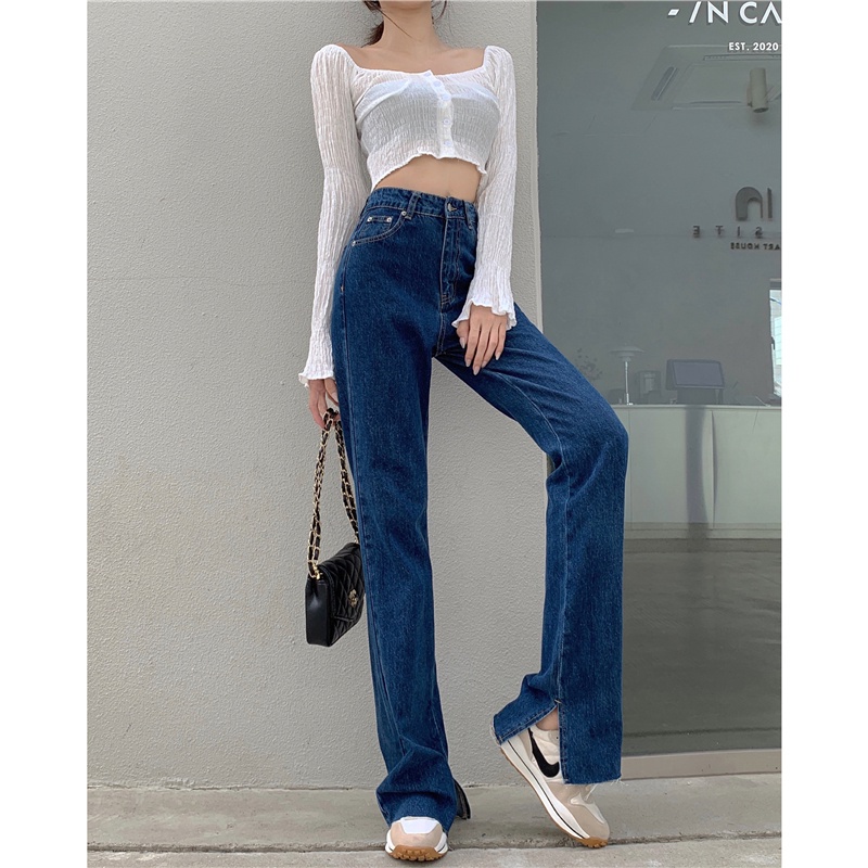 Quần jean lưng cao phối xẻ tà phong cách mùa thu thời trang