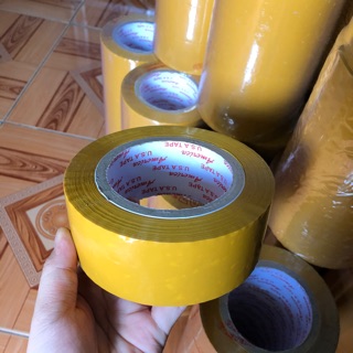Băng keo dán thùng ( lẽ 1 cuộn 200ya 400G )