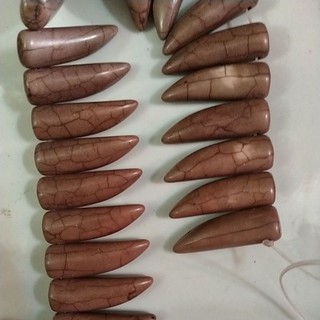 2viên đá ngọc lam nâu hình viên đạn 10x30mm