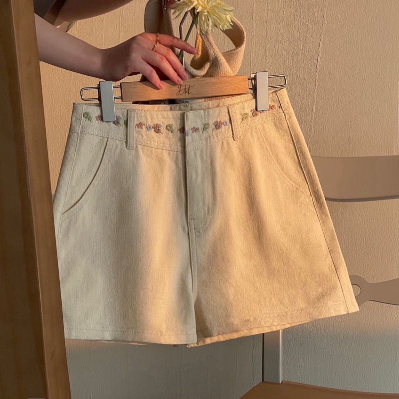 Quần jeans/short trắng cạp cao thêu hoa cho nữ