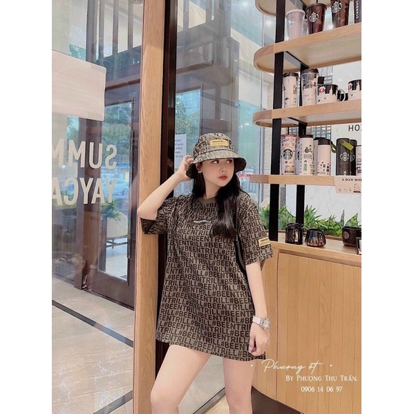 Áo phông thụng chữ logo tay vàng