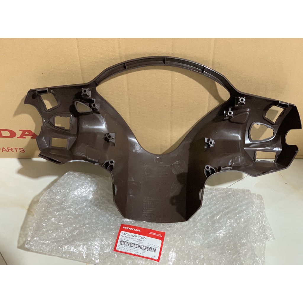 Nắp tay lái sau - gáy HONDA SH MODE năm 2018 màu Nâu.