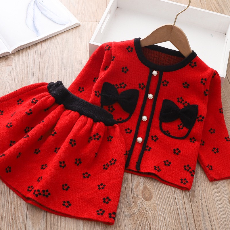Váy bé gái họa tiết hoa đào 2 nơ túi ngực áo croptop và chân váy 8-30kg XHN1092