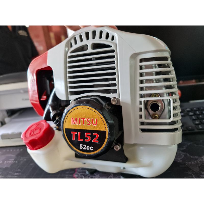 Động cơ 2 thì .Động cơ máy cắt cỏ TL52