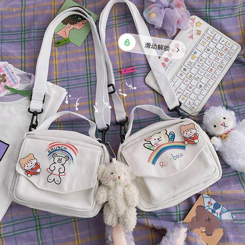 Túi đeo chéo vải canvas họa tiết gấu hoạt hình dễ thương dành cho nữ