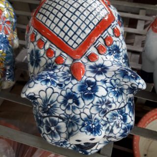 Lợn tiết kiệm vẽ bách hoa