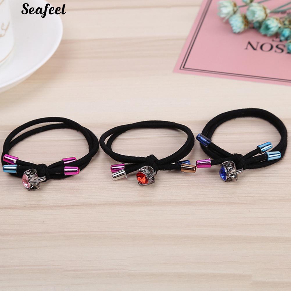 Thun cột tóc đính đá.