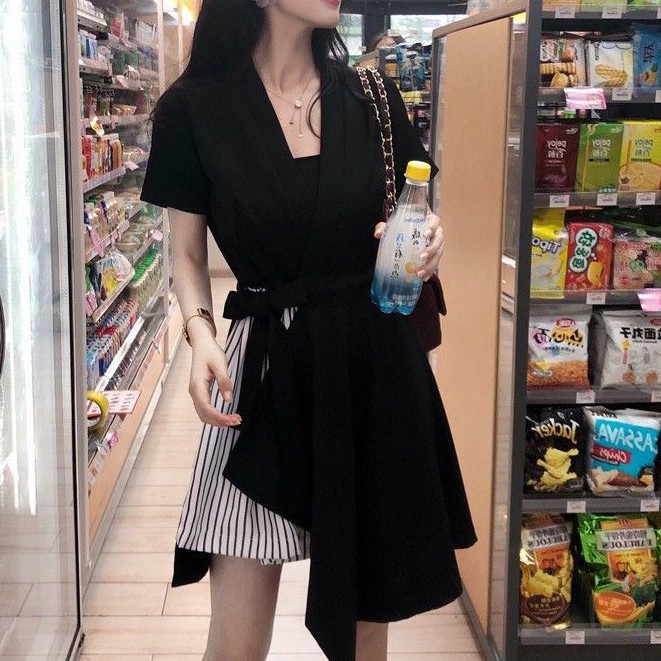 Women's office dress with short sleeves and black skirt