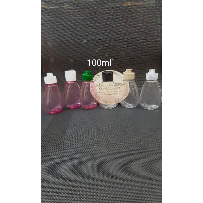 Chai nhựa tam giác 100ml nắp bật