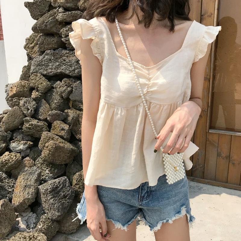 Áo hai dây IELGY dáng rộng màu xanh lá / mơ hở lưng phong cách Hàn Quốc cho nữ