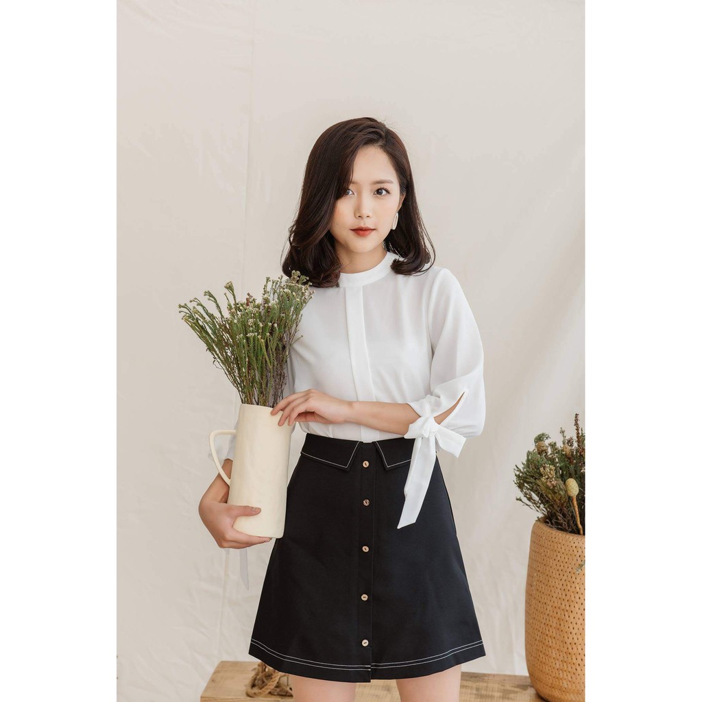 chân váy chữ a đắp vạt phối cúc thời trang | BigBuy360 - bigbuy360.vn