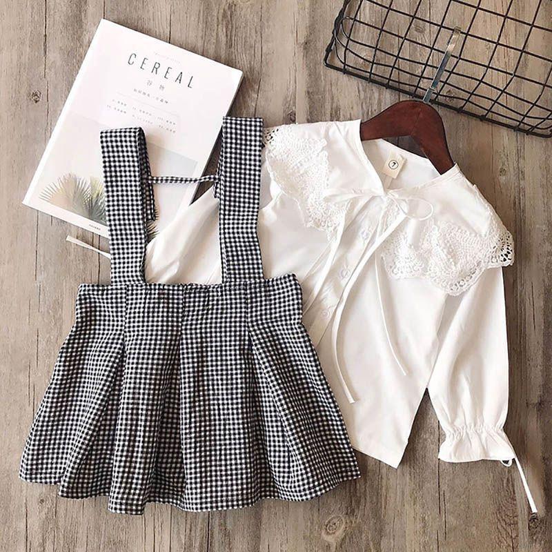 Set áo thun tay dài phối ren và váy sọc caro cho bé gái