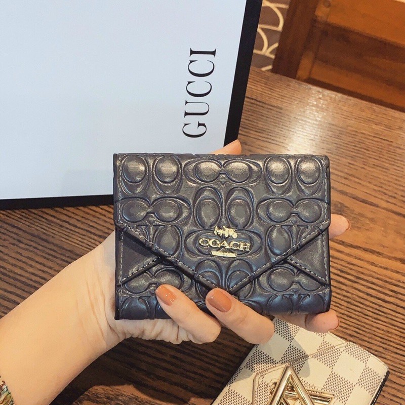 Ví COACH cầm tay